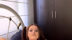 Busty curly brunette with big boobs fucks on couch