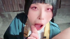 Asian bimbo sucks on a big cock close up
