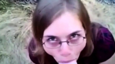 Nerdy Chick Sucks A Big White Dick In The Great Outdoors